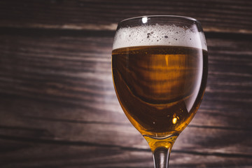 Glass of beer on wooden	