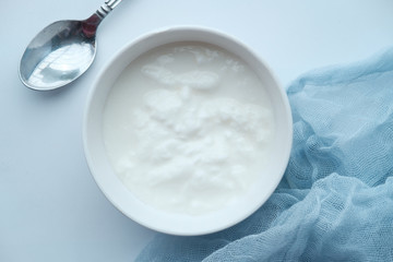 Close up of greek yogurt in a bowl on table 
