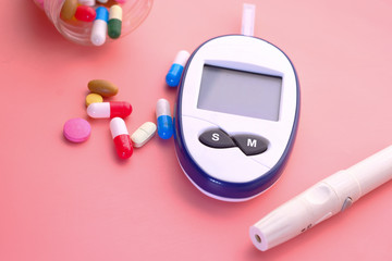  blood sugar measurement kits for diabetes on pink background 