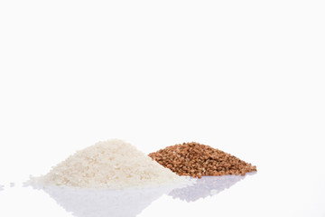 two piles of buckwheat and rice