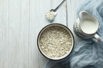 high angle view of oats flakes in a bowl on table 