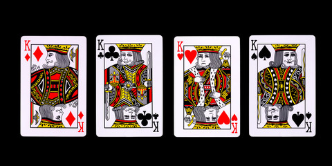 Playing cards for poker game on black background with clipping path.