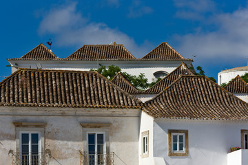 Typical four-sided roofs, characteristic of the region and of oriental origin in Tavira, Algarve, Portugal