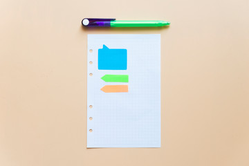 Note book and note paper on a grown background