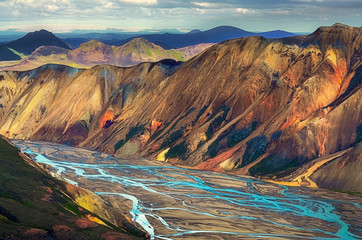 Landscape view of Landmannalaugar colorful volcanic mountains and river, Iceland - obrazy, fototapety, plakaty