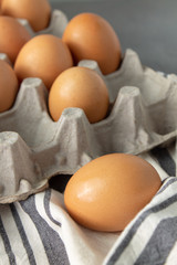 Large flat of brown eggs