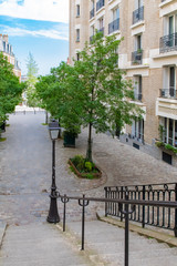 Fototapeta premium Paris, Montmartre, typical buildings and staircase, romantic view 