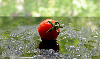 cherry tomatoes in water drops