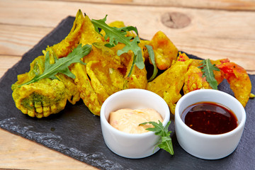 deep fried vegetables with sauces