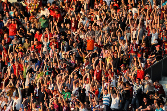 Full Frame Shot Of Spectators Cheering At Stadium