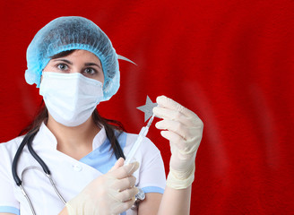 Scientist woman with test tube Coronavirus or COVID-19 against Turkey flag. Research of viruses in laboratory for prevention of a pandemic in Turkey