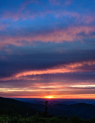 Fototapeta na wymiar Soft Sunset Light Fades Over Blue Ridge Mountains