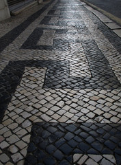 Traditional Portuguese decorate pavement sidewalk. Lisbon. Portugal.