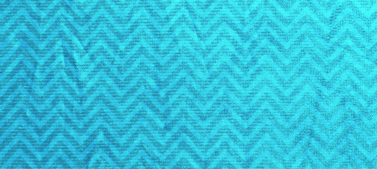 Wrinkled bright turquoise silver fabric. Texture background for design