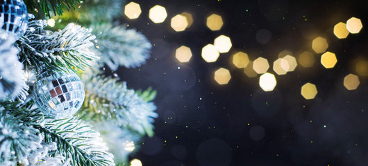 Fototapeta na wymiar Christmas tree background and Christmas decorations. Blurred background