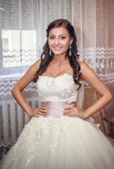 portrait of a bride near the window