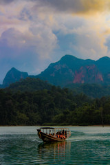 Naklejka na ściany i meble Long boat in Khao Sok National Park