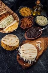 Different types of Venezuelan and Colombian Arepas. Typical Latin American breakfast