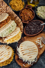 Different types of Venezuelan and Colombian Arepas. Typical Latin American breakfast