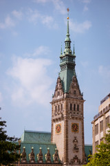 Obraz premium The clock tower of the Hamburg City Hall or Rathaus