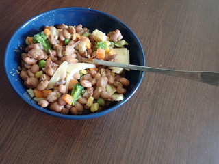  bowl of beans vegetable salad with cheese