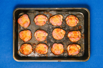 Baked cheese and sausage sandwiches. Cooking a quick meal. Crispy, hot and delicious.