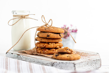 Chocolate Chip Cookies. Homemade baking. Round shape, medium size. On a white wooden background.