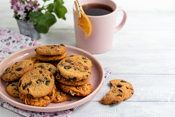 Chocolate Chip Cookies. Homemade baking. Round shape, medium size. On a white wooden background.