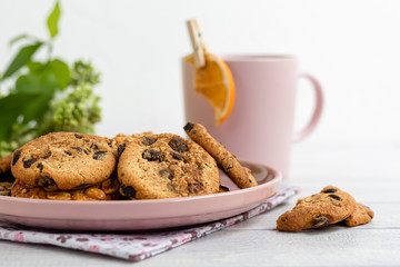 Chocolate Chip Cookies. Homemade baking. Round shape, medium size. On a white wooden background.