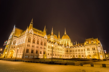 Night view of the Hungarian Parliament Building in Budapest, Hungary.
