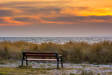 Bench with a view of the Baltic Sea during sunset Hel Peninsula. Poland