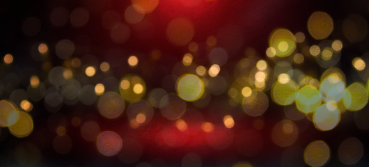 Blurred background with bokeh. Christmas and Happy New Year greeting card.