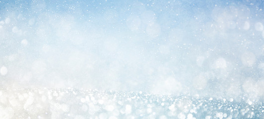 Blurred background with bokeh. Christmas and Happy New Year greeting card.