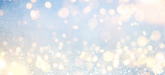 Blurred background with bokeh. Christmas and Happy New Year greeting card.
