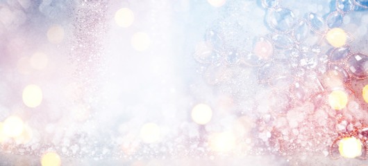 Blurred background with bokeh. Christmas and Happy New Year greeting card.