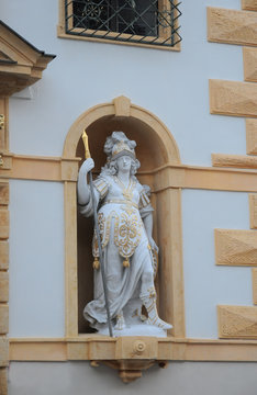 Beautiful marble statue of Bellona in the wall niche on the street, Graz, Austria