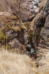 river flowing between the rocks