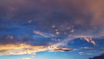 Beautiful sunset sky. Dramatic colorful clouds after sunset. Nature backgrounds