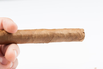 Old lighter and cigar isolated on white background. Metal style gasoline lighter .Copy space