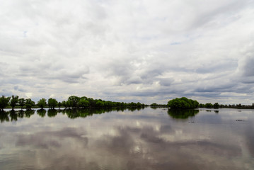 A river that overflowed its banks.Spring flood