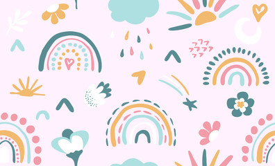 Seamless vector pattern with hand drawn rainbows and sun. Trendy baby texture