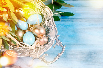 Fototapeta na wymiar Easter background with olive tree branches and eggs