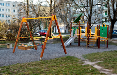 "STOP" tape on the playground due to Coronavirus.