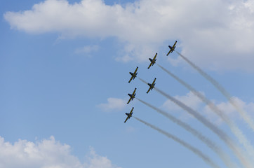 Formation of aircrafts, flying above the clouds
