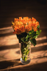 bouquet of orange roses in a vase