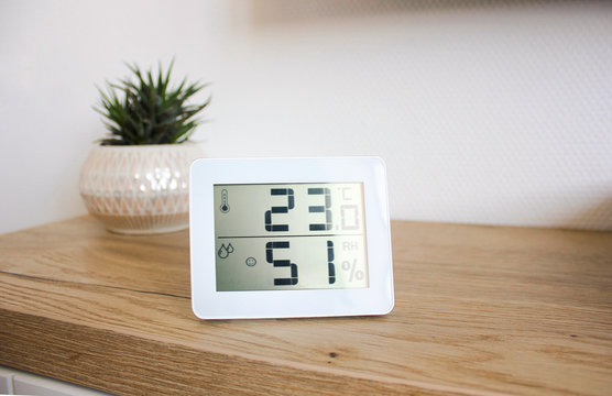 Thermometer Hygrometer Measuring The Optimum Temperature And Humidity In A House, Apartment Or Office, A Photo For Articles About The House’s Microclimate, Health, Disease Relief And Virus Treatment