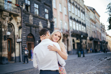 Fototapeta premium Beautiful couple in love dating outdoors and smiling