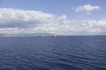 Many ships gathered in a raid near the coast.