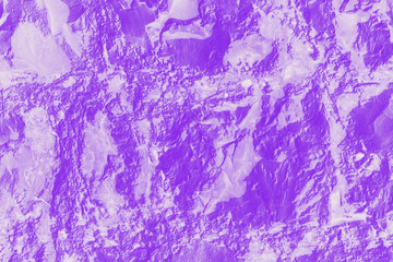 Fototapeta na wymiar Wall sandstone texture background. Purple violet grunge surface, stone texture. Voluminous background, toned