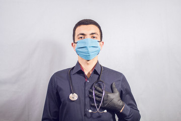 The doctor put his hand on his chest